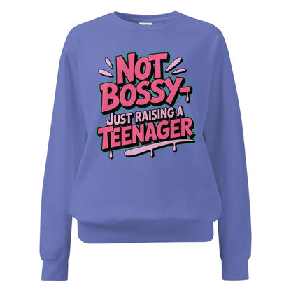 Blue sweatshirt with 'Not Bossy Just Raising a Teenager' text on a white background