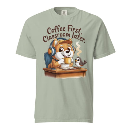 Light green t-shirt with a cartoon dog and bird design and text 'Coffee First, Classroom Later' on a white background.