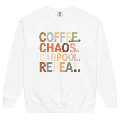 White sweatshirt with colorful text 'COFFEE. CHAOS. CARPOOL. REPEAT.' on a white background