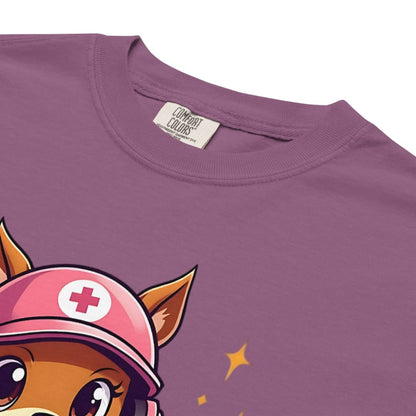 Cute cartoon nurse squirrel in scrubs and cap holding a softball and first aid kit with quote “Saving Lives Between Innings” – printed on garment-dyed heavyweight cotton shirt for nurse softball moms