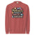 Sweatshirt design with text “Motherhood. Powered by Snacks & Sarcasm.” featuring colorful macarons and a steaming coffee cup on vintage-washed cotton fleece.