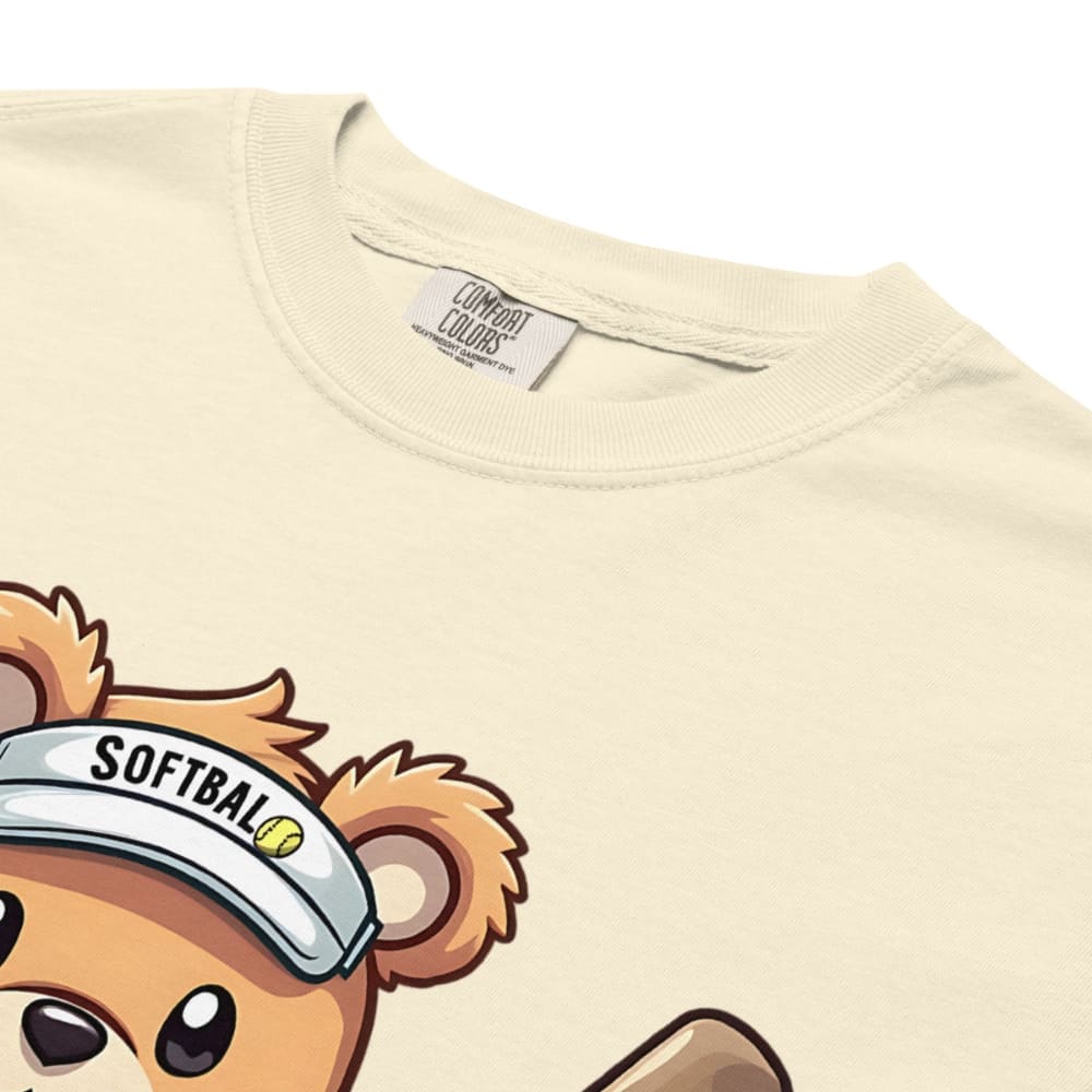 Cartoon bear holding softball bats and ball wearing a visor labeled “Softball” – printed on garment-dyed heavyweight t-shirt for sporty moms