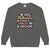 Sweatshirt design with text “Motherhood. Powered by Snacks & Sarcasm.” featuring colorful macarons and a steaming coffee cup on vintage-washed cotton fleece.