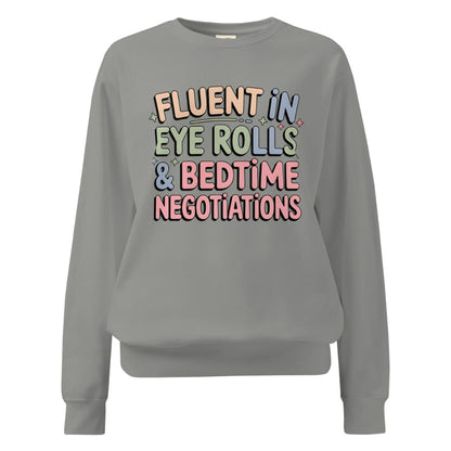 Gray sweatshirt with colorful text on a white background