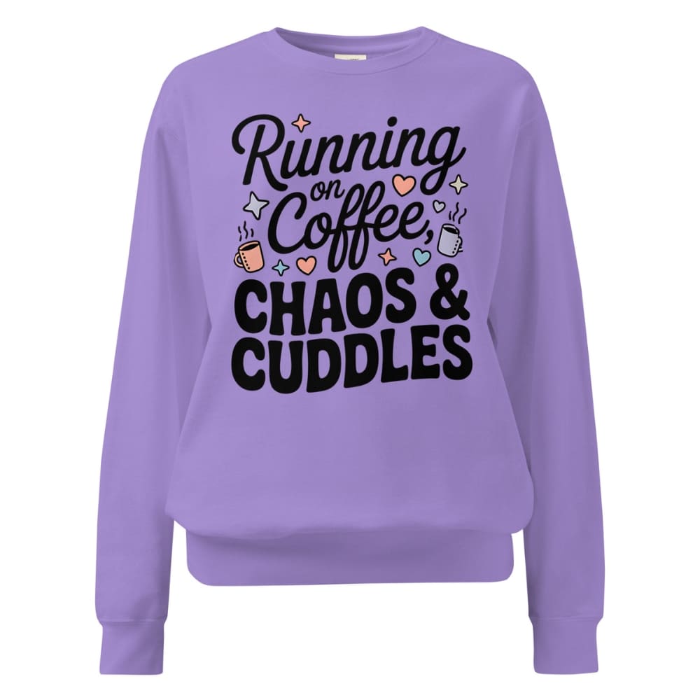 Purple sweatshirt with text 'Running on Coffee, Chaos & Cuddles' on a white background