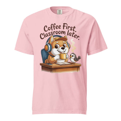 Pink t-shirt with a cartoon dog drinking coffee and text 'Coffee First, Classroom Later' on a white background.