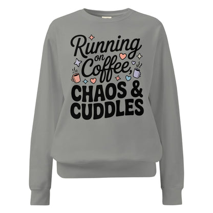 Gray sweatshirt with text 'Running on Coffee, Chaos & Cuddles' on a white background