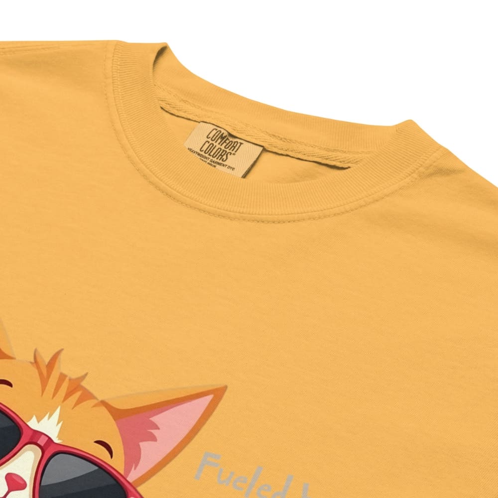 Cool cat with sunglasses holding a softball bat and coffee cup, beside text “Fueled by Coffee & Curveballs” – printed on soft heavyweight t-shirt for sporty moms