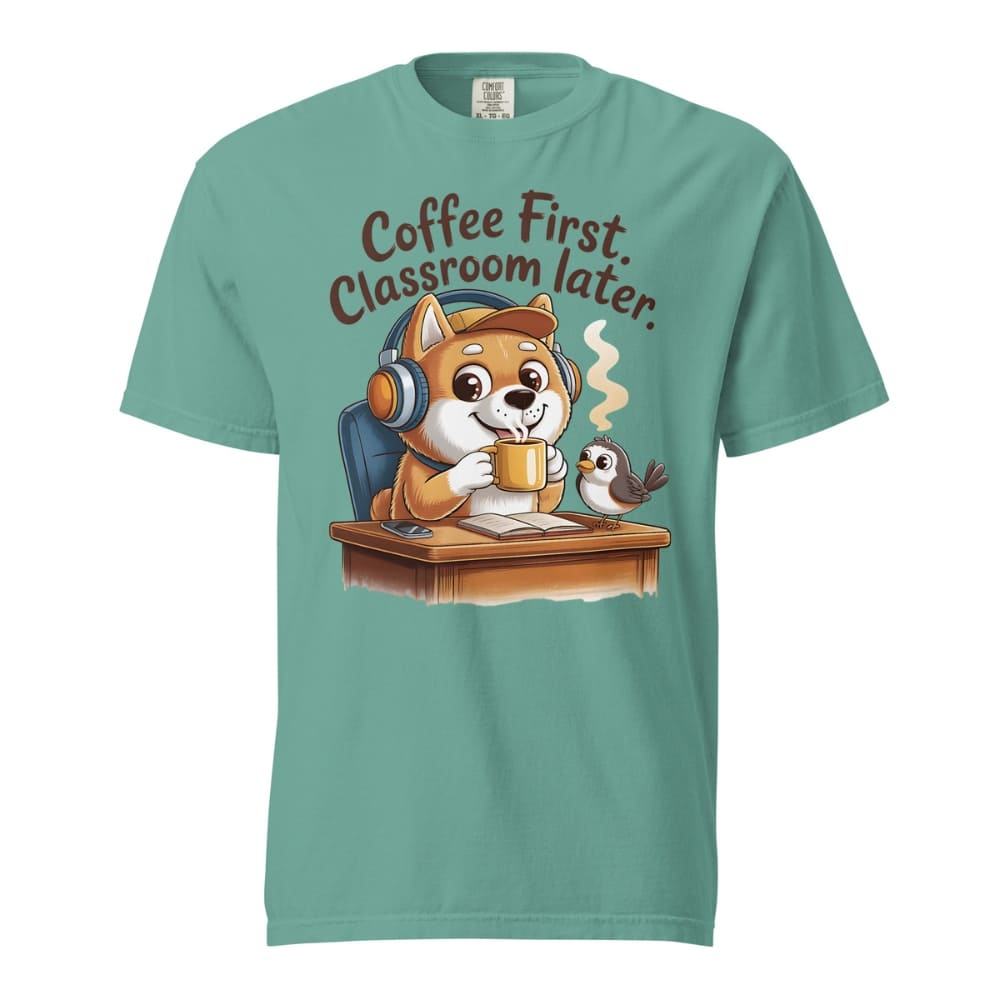Teal t-shirt with a cartoon dog and bird design and text 'Coffee First, Classroom Later' on a white background.