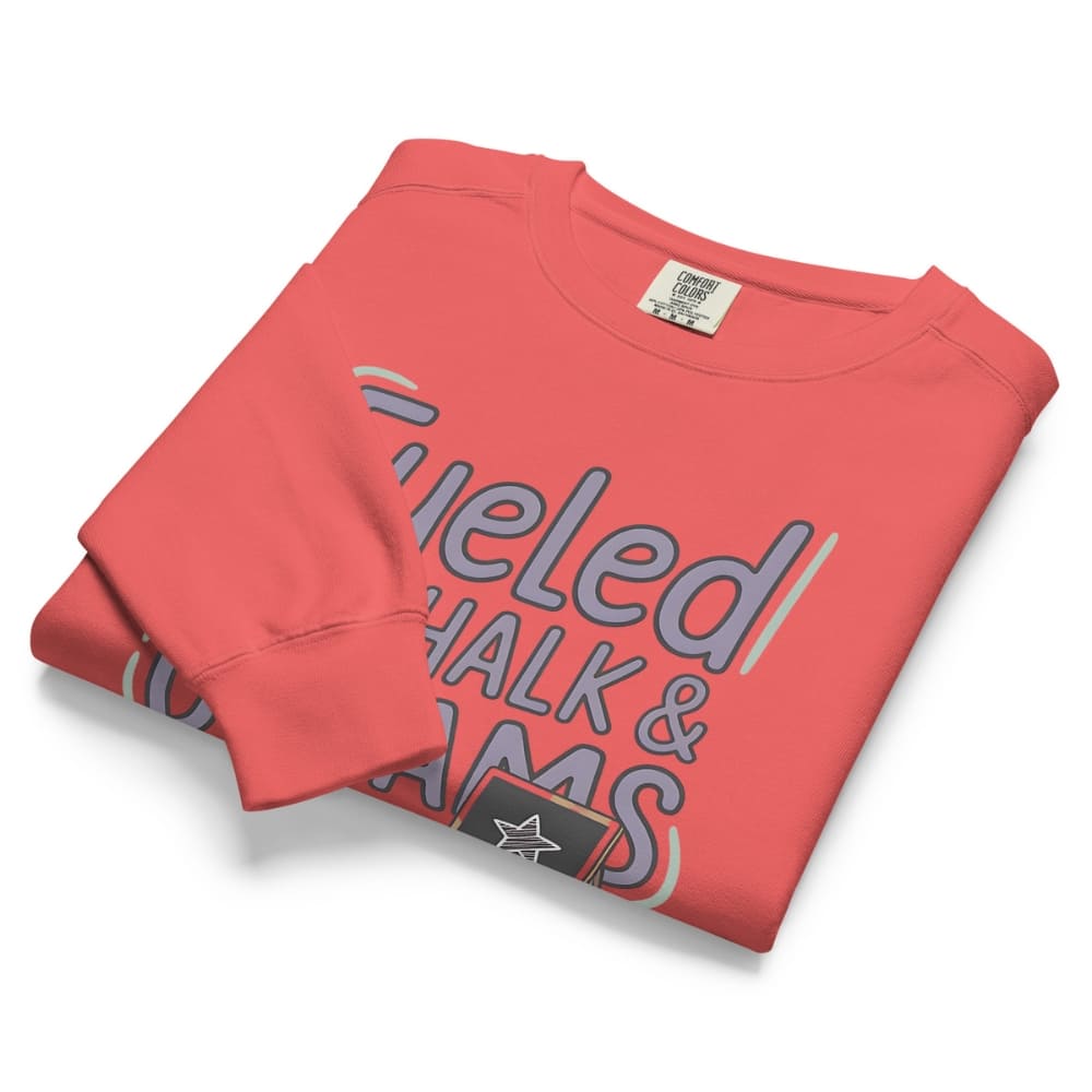 Fueled by Chalk & Dreams printed design on a vintage-style garment-dyed sweatshirt with chalkboard illustration – soft fleece ideal for teachers