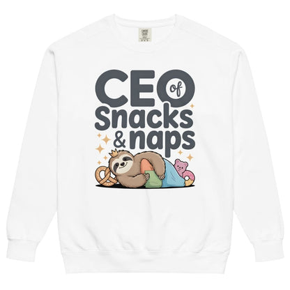 "CEO of Snacks & Naps" printed sweatshirt featuring a sloth in a crown surrounded by pretzels and plushies on vintage-washed cotton fleece