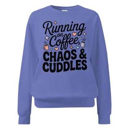 Blue sweatshirt with text 'Running on Coffee, Chaos & Cuddles' on a white background