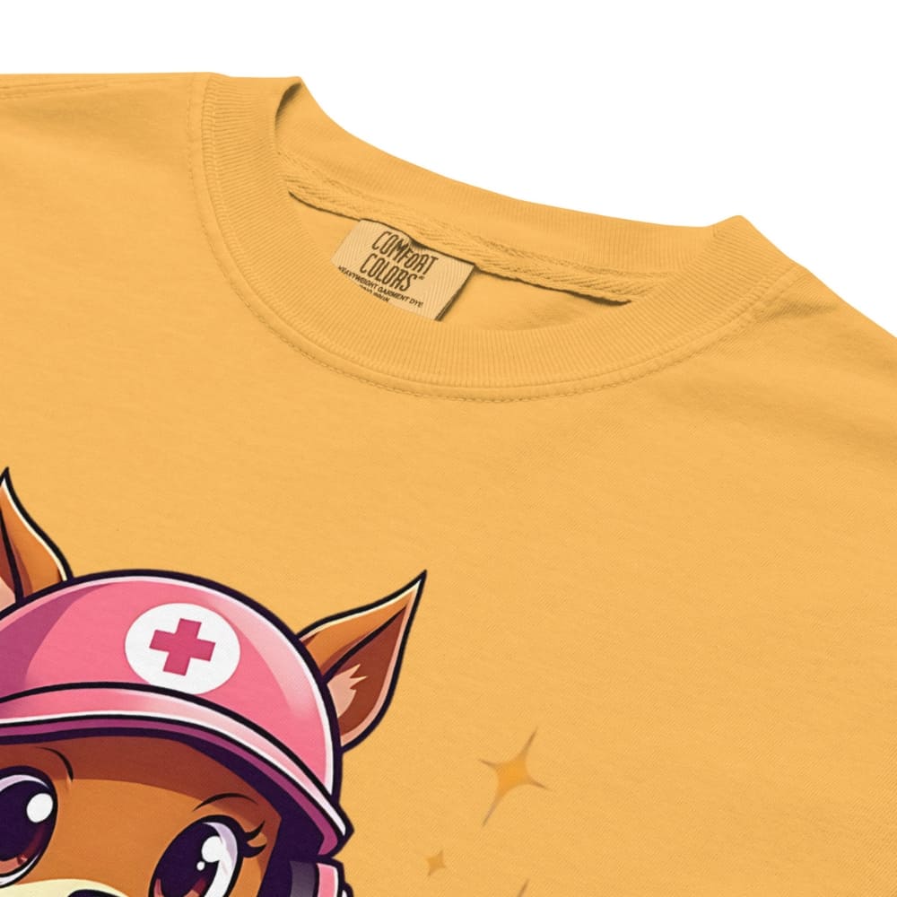 Cute squirrel nurse cartoon in scrubs, pink cap, and headset holding a softball and medical kit with the phrase “Saving Lives Between Innings” — printed on a heavyweight cotton t-shirt