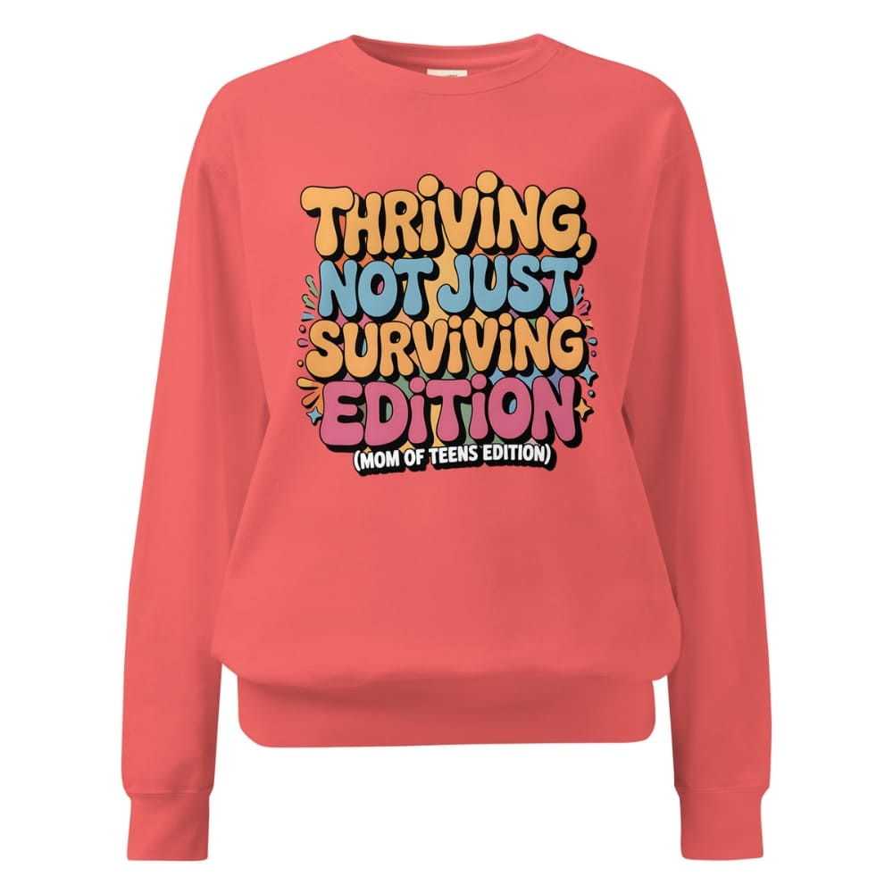 Coral sweatshirt with colorful text design on a white background