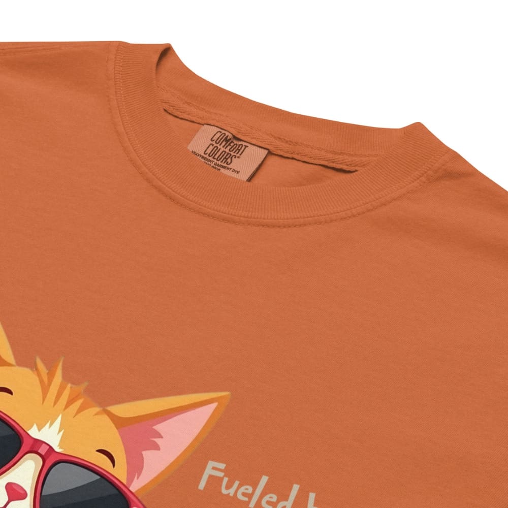 Cool cat with sunglasses holding a softball bat and coffee cup, beside text “Fueled by Coffee & Curveballs” – printed on soft heavyweight t-shirt for sporty moms