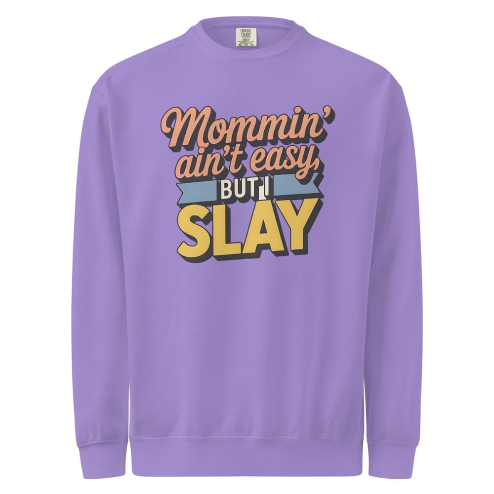 “Mommin' Ain’t Easy But I Slay” retro-style DTG printed design in peach, blue, and yellow on vintage garment-dyed fleece sweatshirt