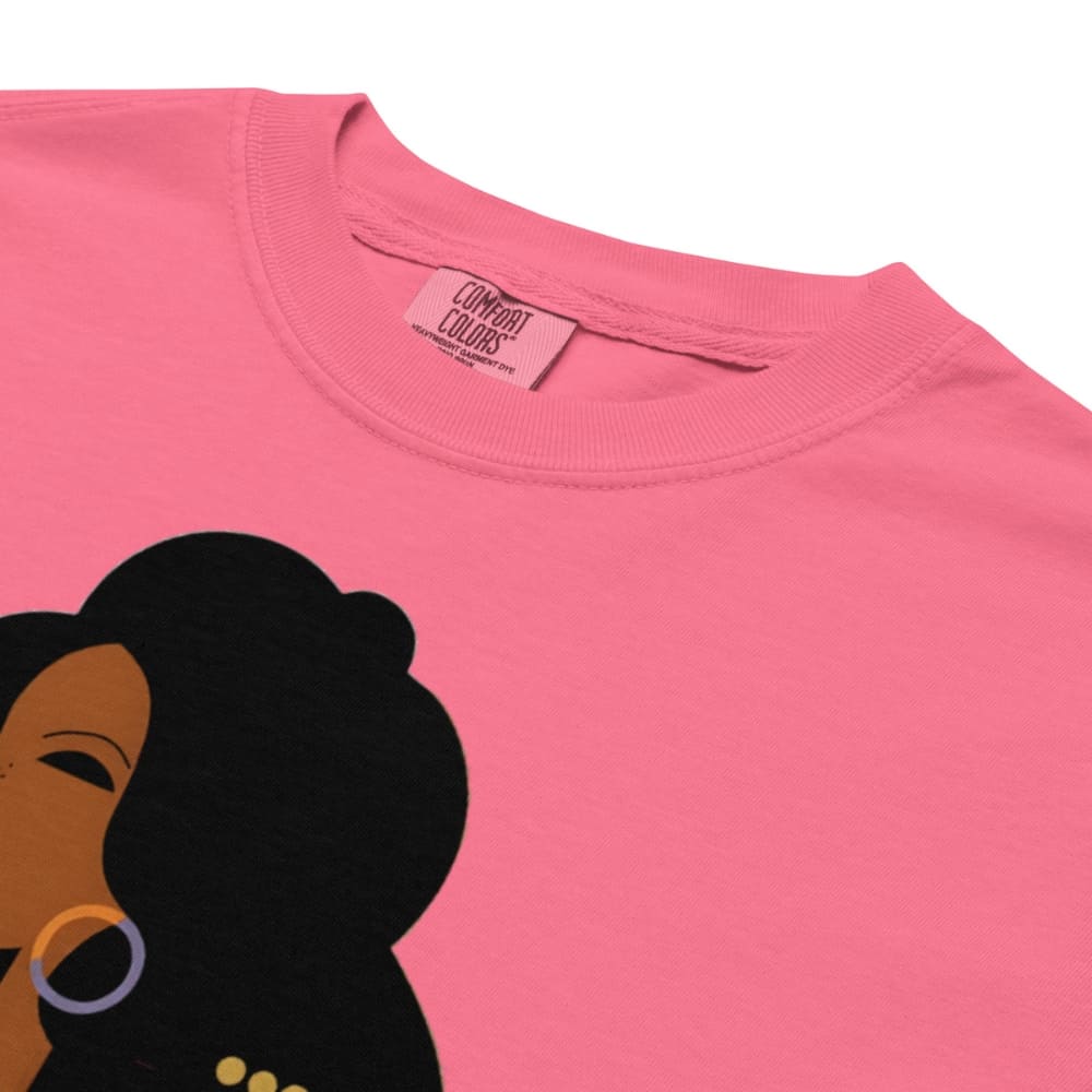 Pink t-shirt with a graphic of a woman's face and 'Comfort Colors' tag.
