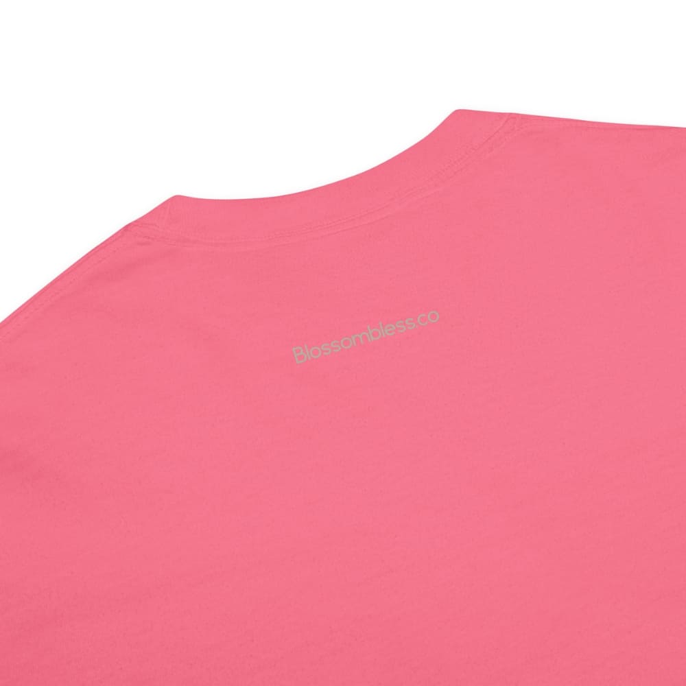 Close-up of a pink t-shirt with a logo on a white background