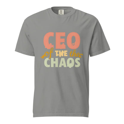 CEO of the Chaos” printed on a heavyweight cotton t-shirt in soft pastel ink, laid flat with a minimal lifestyle background.