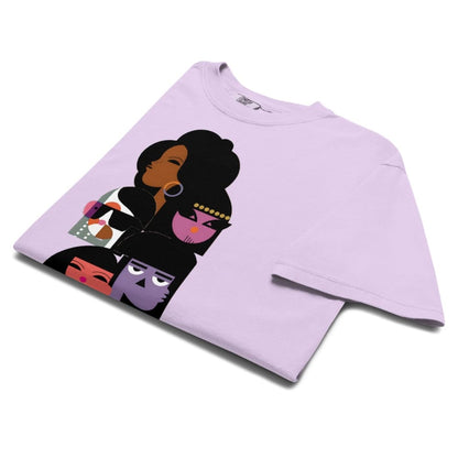 Folded light purple t-shirt with a graphic design on a white background