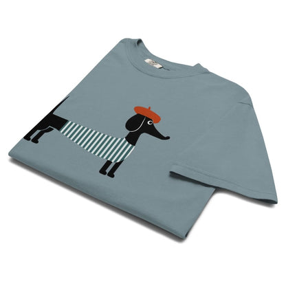 Ice blue t-shirt with a black dog graphic wearing a red hat on a white background