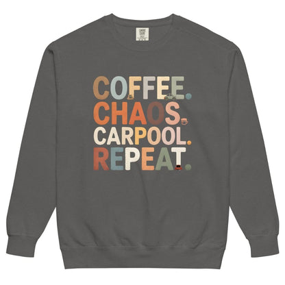 Gray sweatshirt with colorful text 'COFFEE. CHAOS. CARPOOL. REPEAT.' on a white background