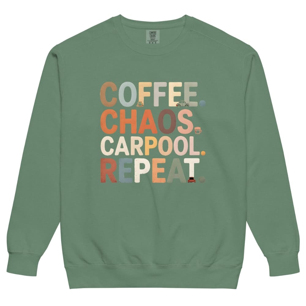 Green sweatshirt with colorful text 'COFFEE. CHAOS. CARPOOL. REPEAT.' on a white background