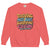 Coral sweatshirt with colorful text design on a white background