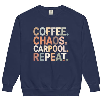 Navy blue sweatshirt with colorful text 'COFFEE. CHAOS. CARPOOL. REPEAT.' on a white background