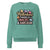 Sweatshirt design with text “Motherhood. Powered by Snacks & Sarcasm.” featuring colorful macarons and a steaming coffee cup on vintage-washed cotton fleece.