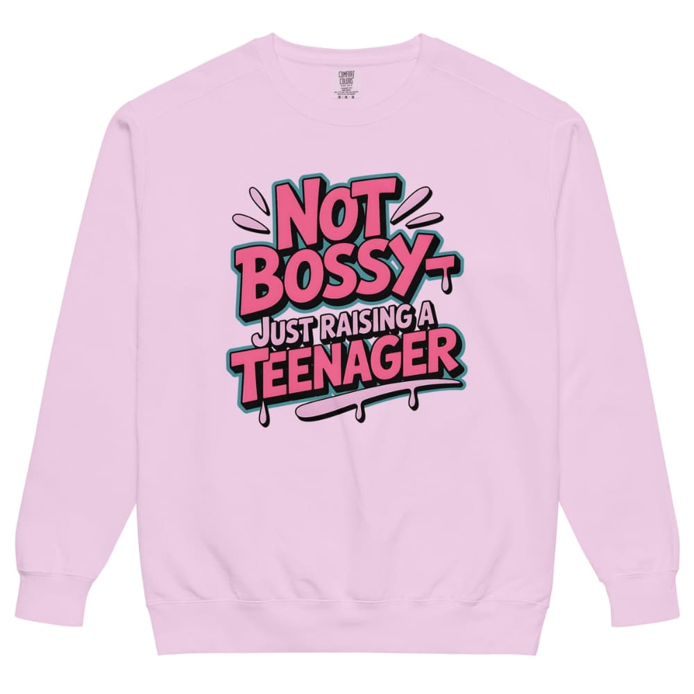 Pink sweatshirt with 'Not Bossy Just Raising a Teenager' text on a white background