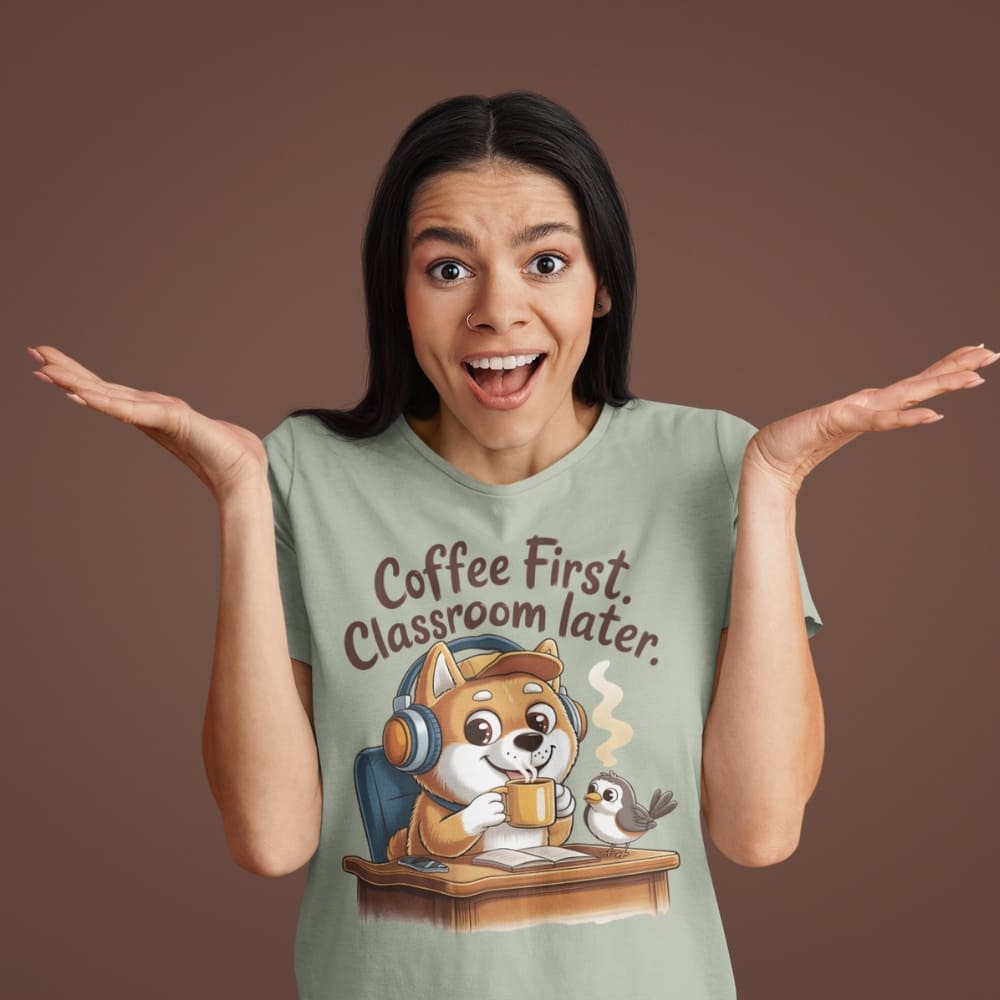 Woman wearing a t-shirt with a cartoon dog and text 'Coffee First, Classroom later.' on a brown background