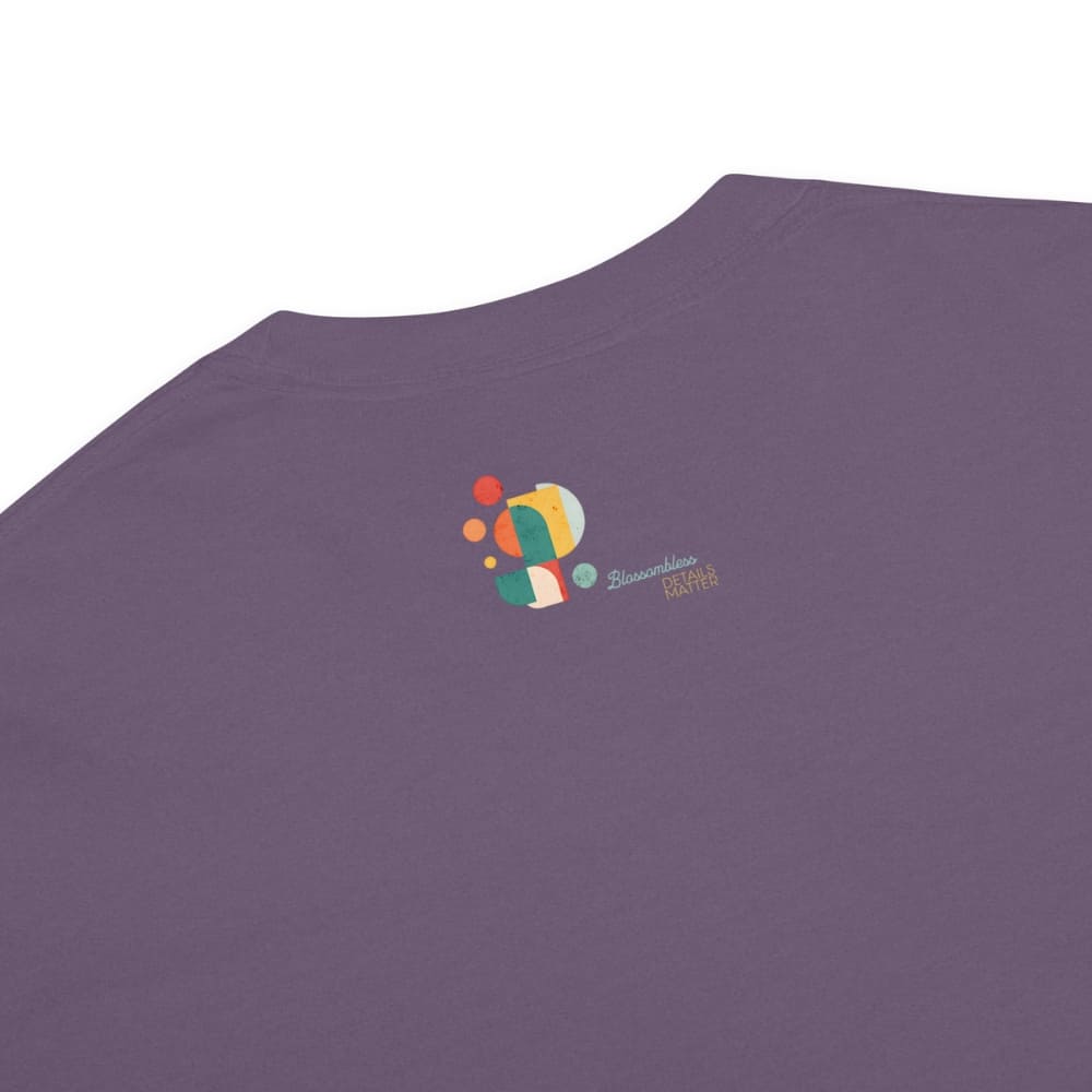 “Living That Scrub Life” colorful text printed on a garment-dyed cotton t-shirt for nurses and healthcare professionals