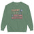 Green sweatshirt with colorful text on a white background