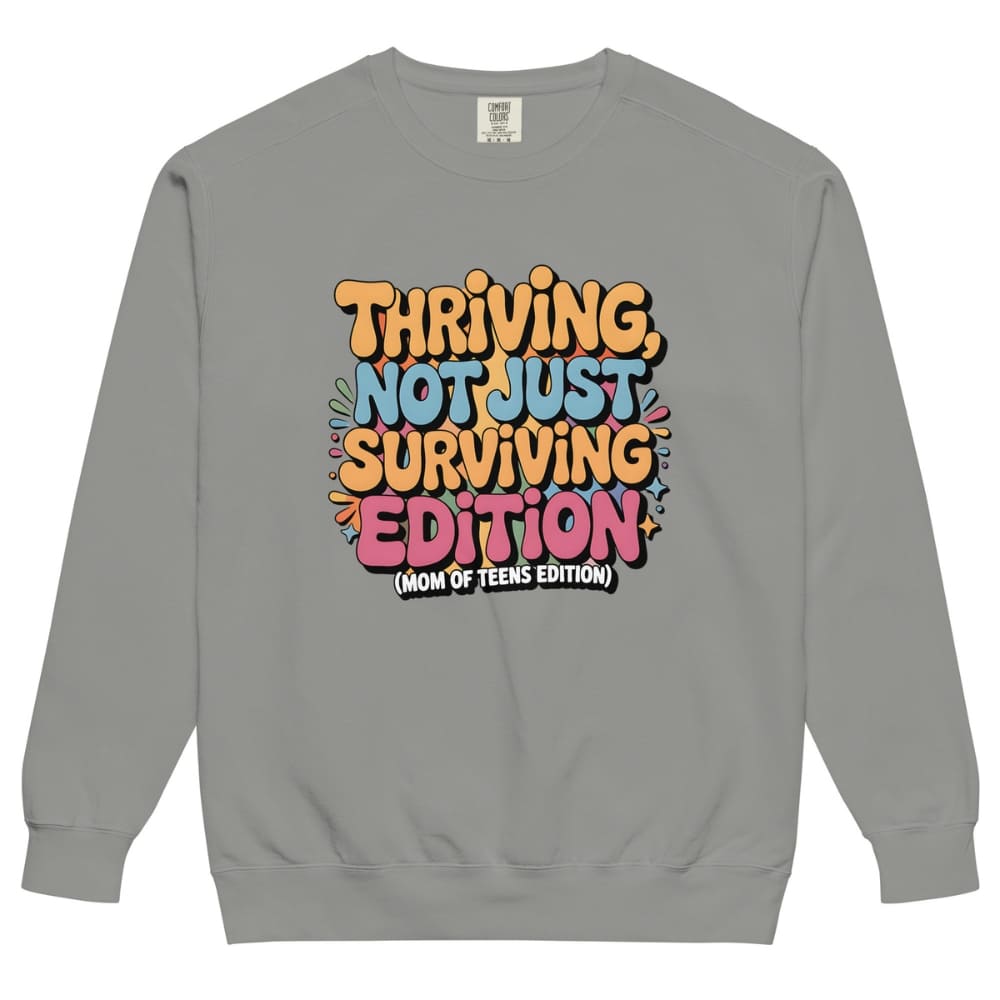 Gray sweatshirt with colorful text design on a white background