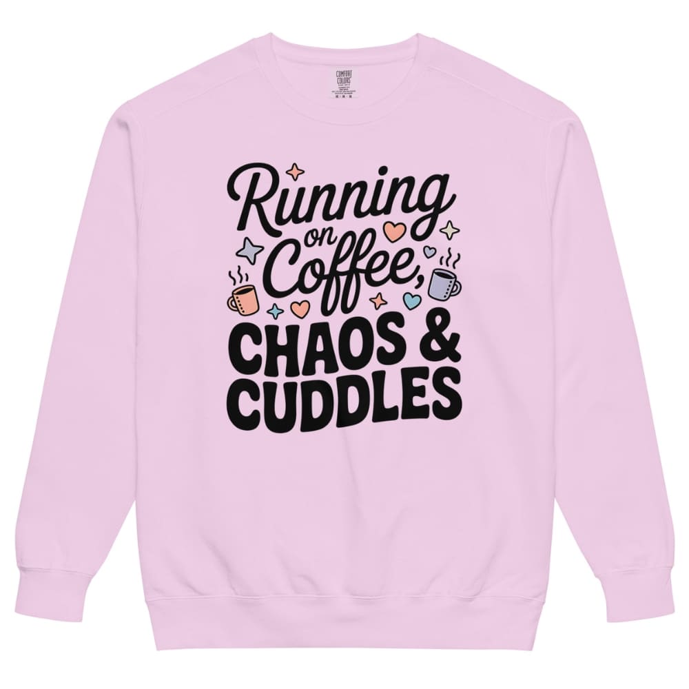 Pink sweatshirt with text 'Running on Coffee, Chaos & Cuddles' on a white background