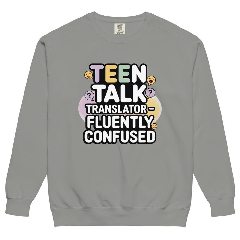 Gray sweatshirt with colorful text 'TEEN TALK TRANSLATOR FLUENTLY CONFUSED' on a white background