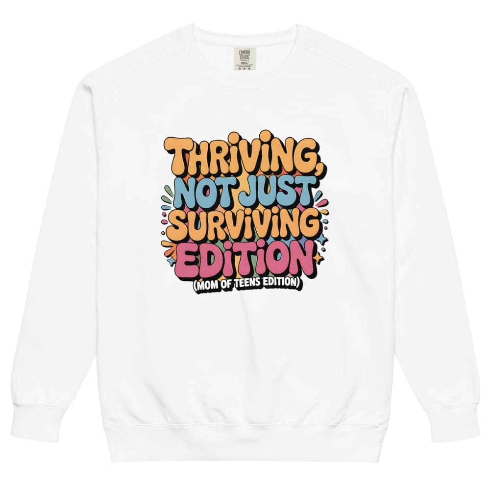 White sweatshirt with colorful text design on a white background