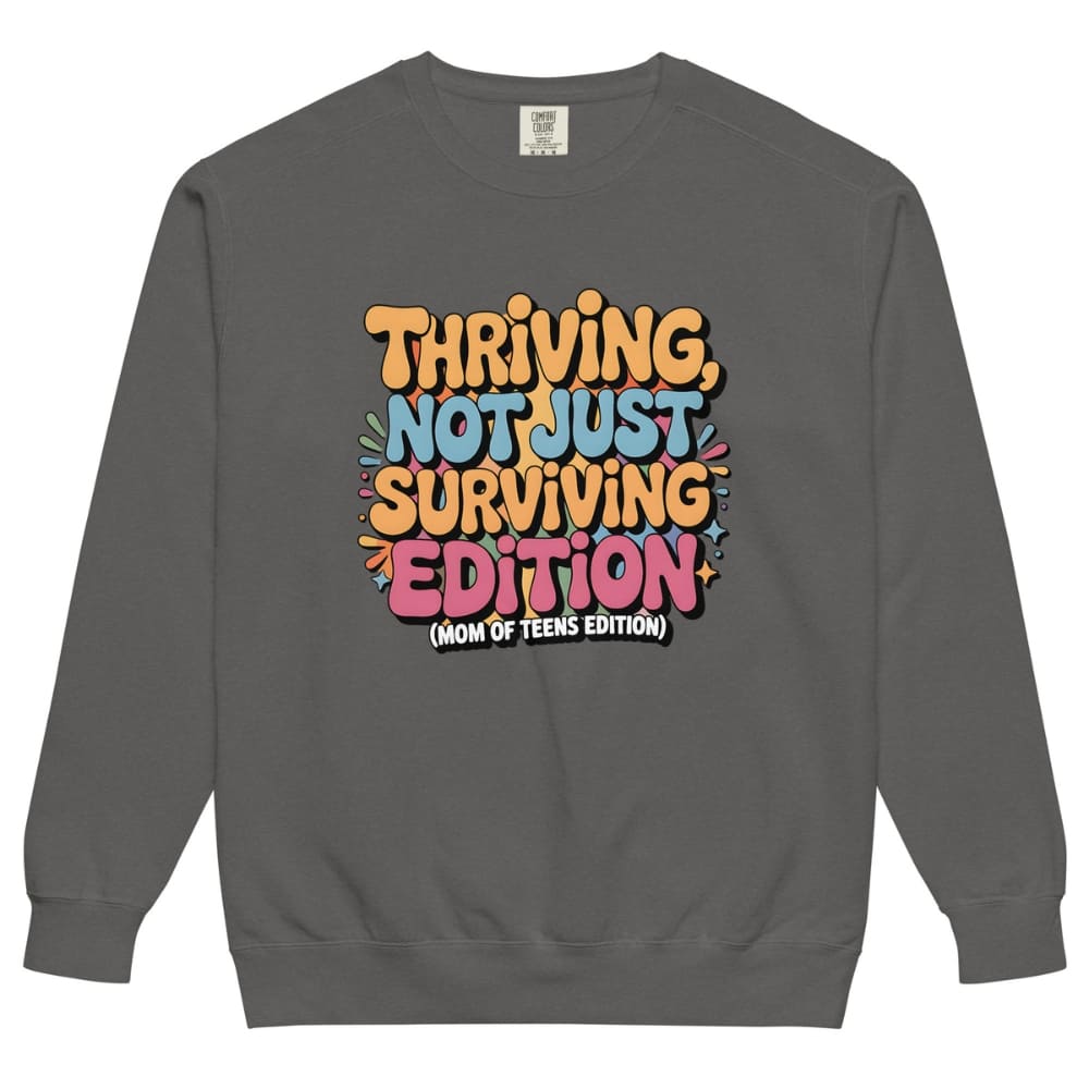 Gray sweatshirt with colorful text design on a white background