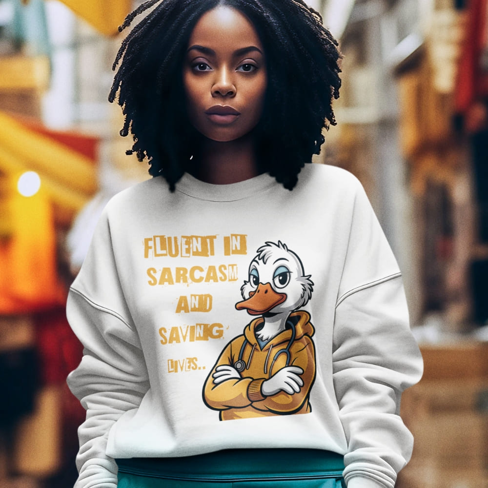 Person wearing a sweatshirt with a cartoon character and text in an urban setting