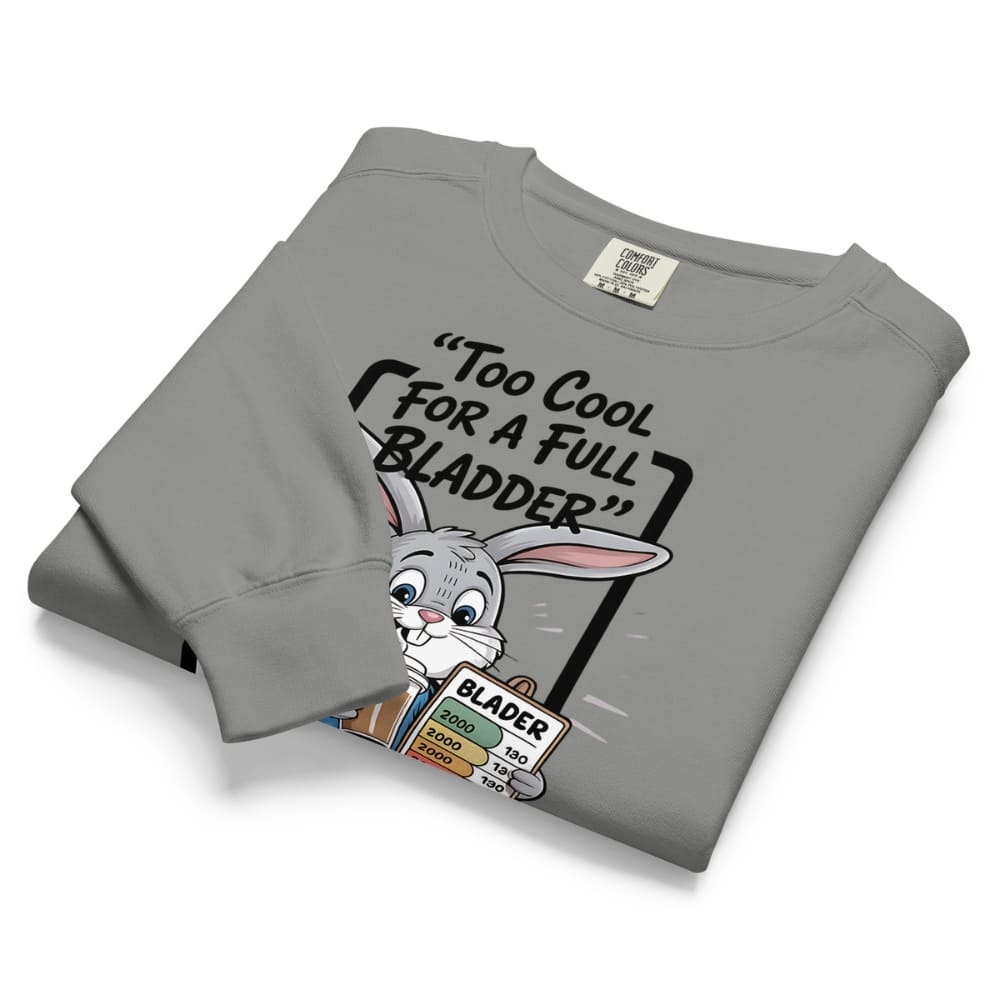 Folded gray sweatshirt with cartoon character and text on a white background