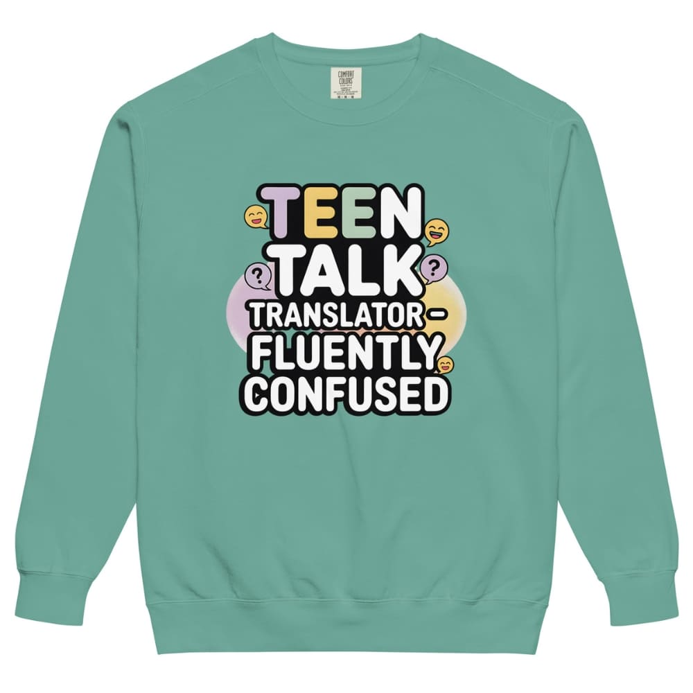 Teal sweatshirt with 'Teen Talk Translator Fluently Confused' text on a white background