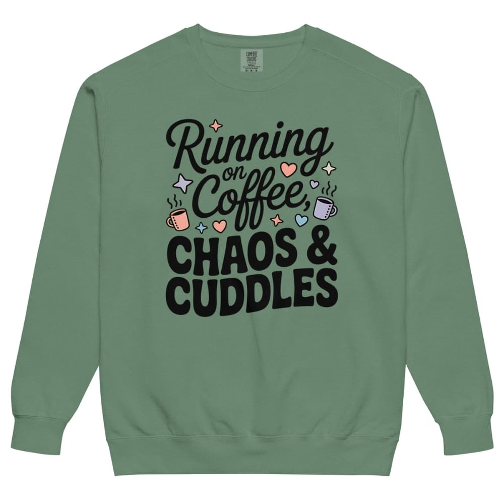 Green sweatshirt with text 'Running on Coffee, Chaos & Cuddles' on a white background