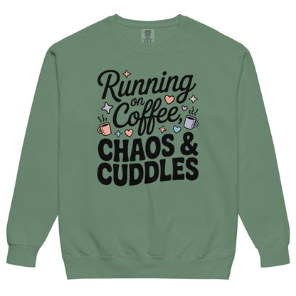 Green sweatshirt with text 'Running on Coffee, Chaos & Cuddles' on a white background