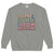Gray sweatshirt with colorful text 'Fluent in Eye Rolls & Bedtime Negotiations' on a white background