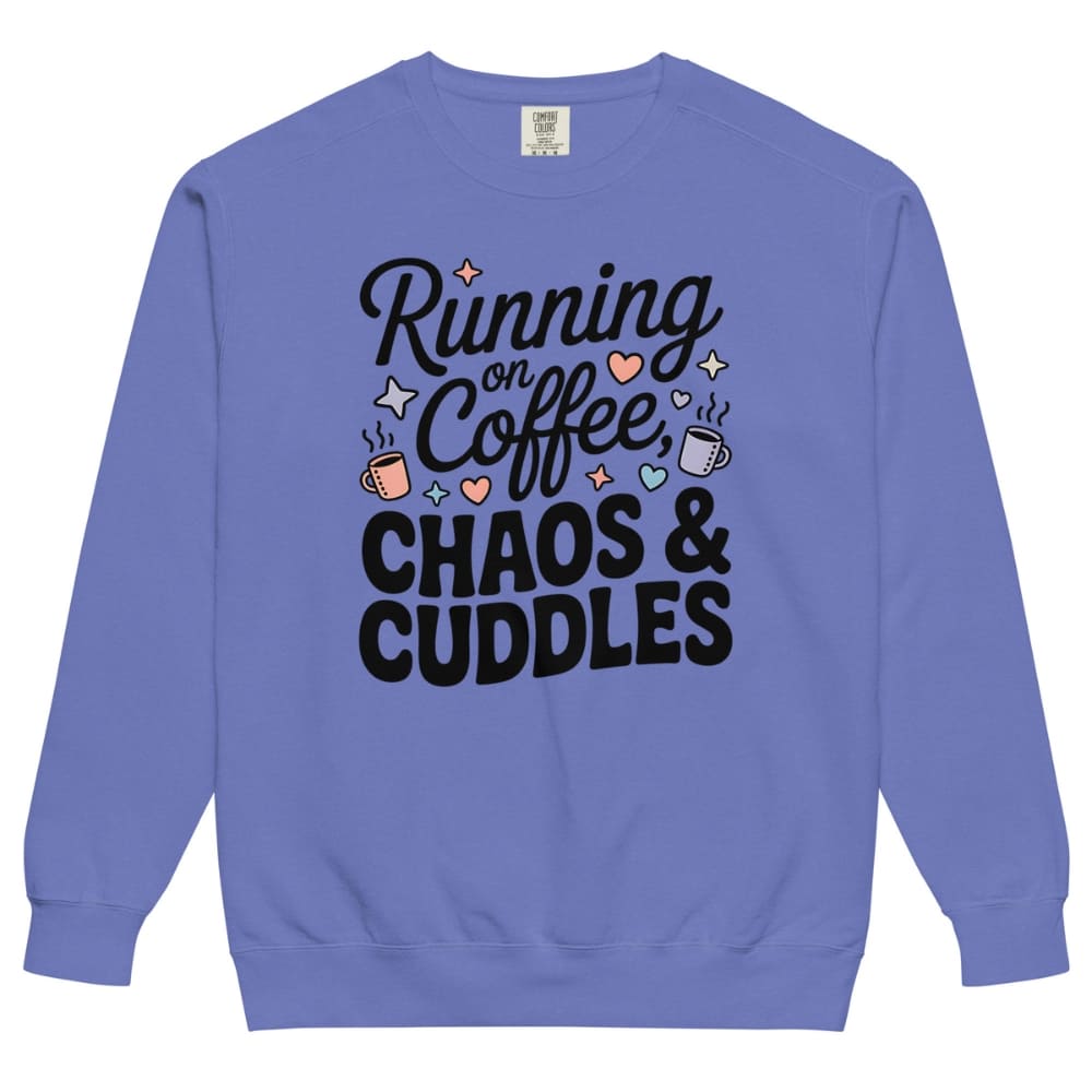 Blue sweatshirt with text 'Running on Coffee, Chaos & Cuddles' on a white background