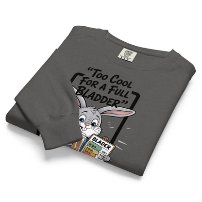 Folded gray sweatshirt with cartoon character and text on a white background