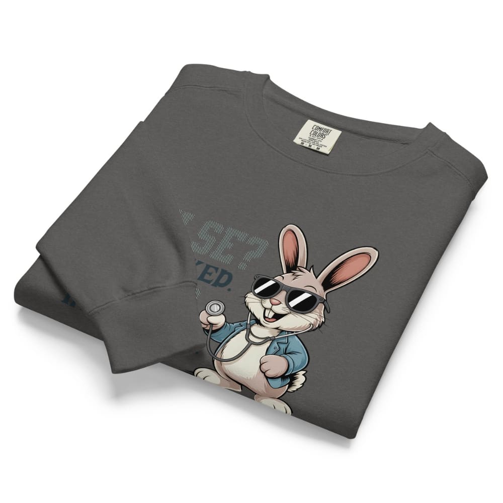 Folded gray sweatshirt with a cartoon rabbit design on a white background