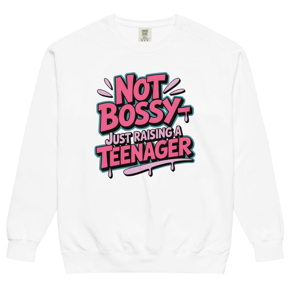 White sweatshirt with colorful text 'Not Bossy Just Raising a Teenager' on a white background
