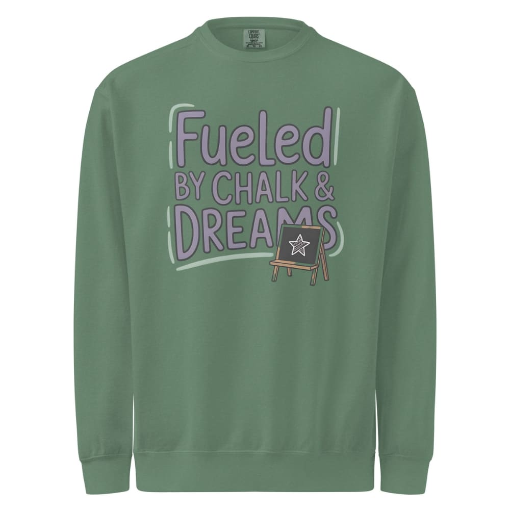 Fueled by Chalk & Dreams printed design on a vintage-style garment-dyed sweatshirt with chalkboard illustration – soft fleece ideal for teachers